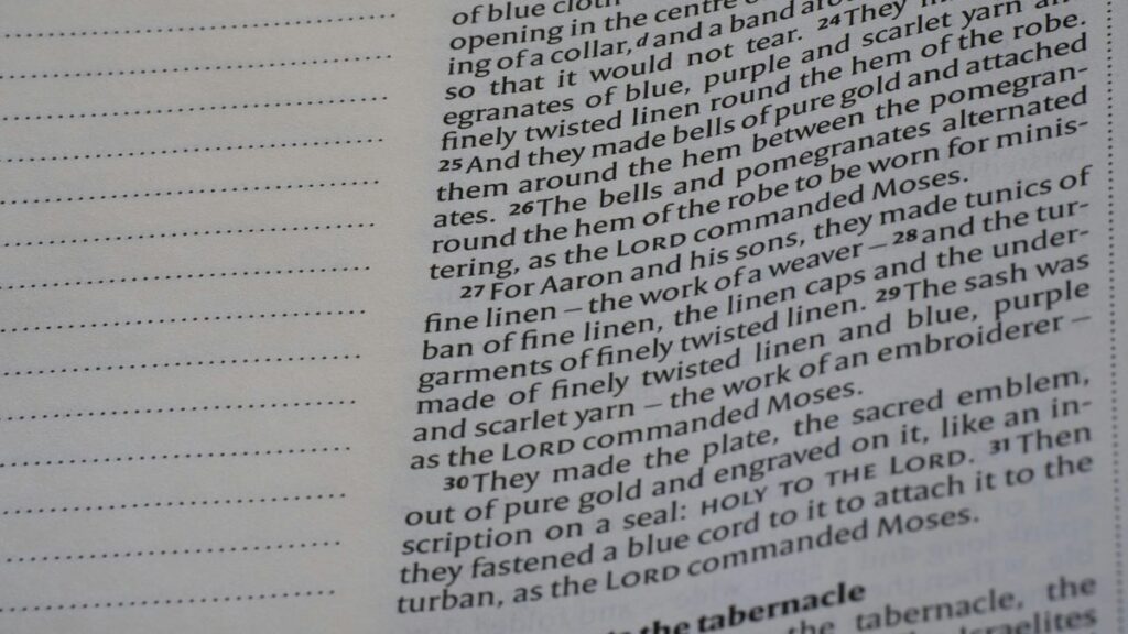 Close-up of an open book with text visible