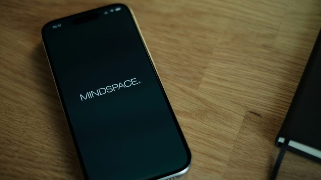 A close up of a cell phone on a table